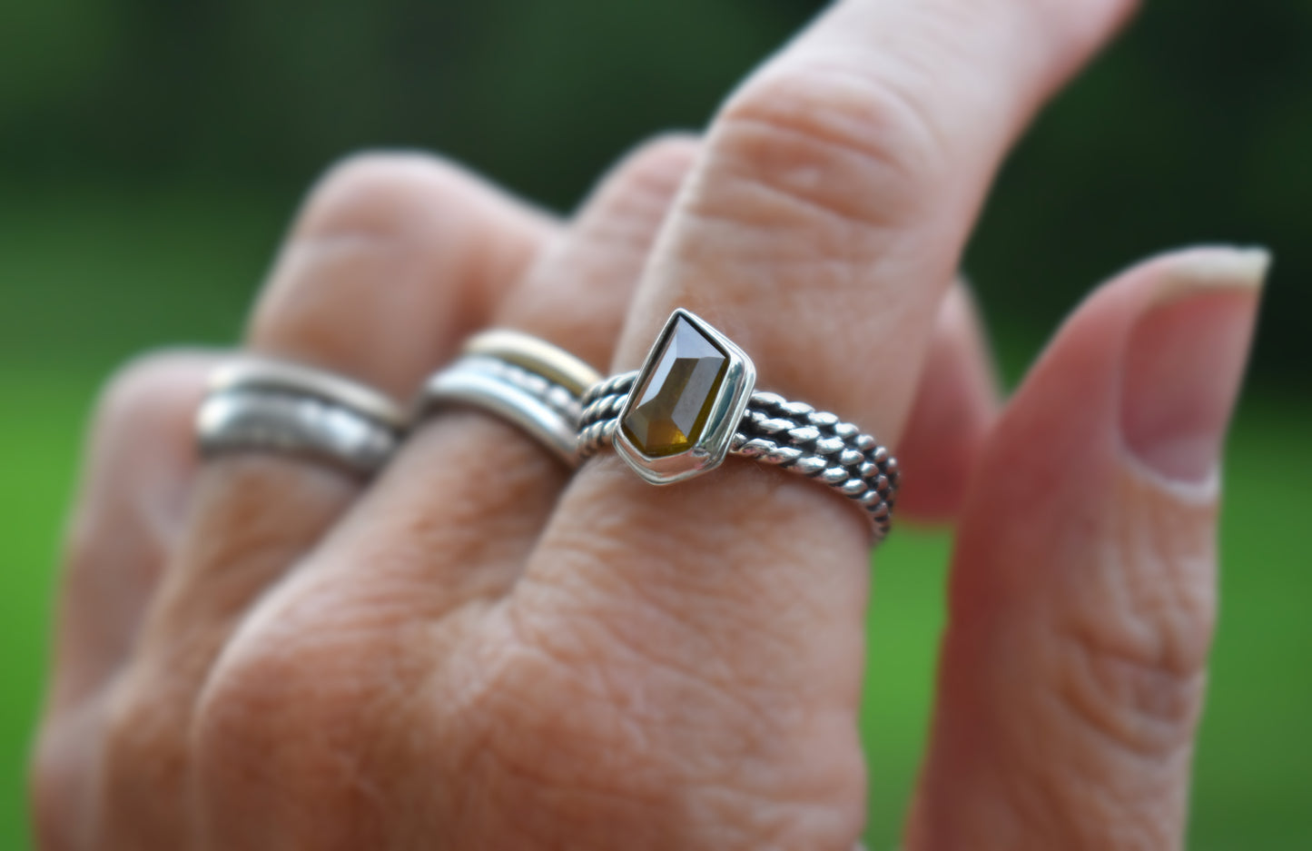 Faceted Sphene Ring - size 8