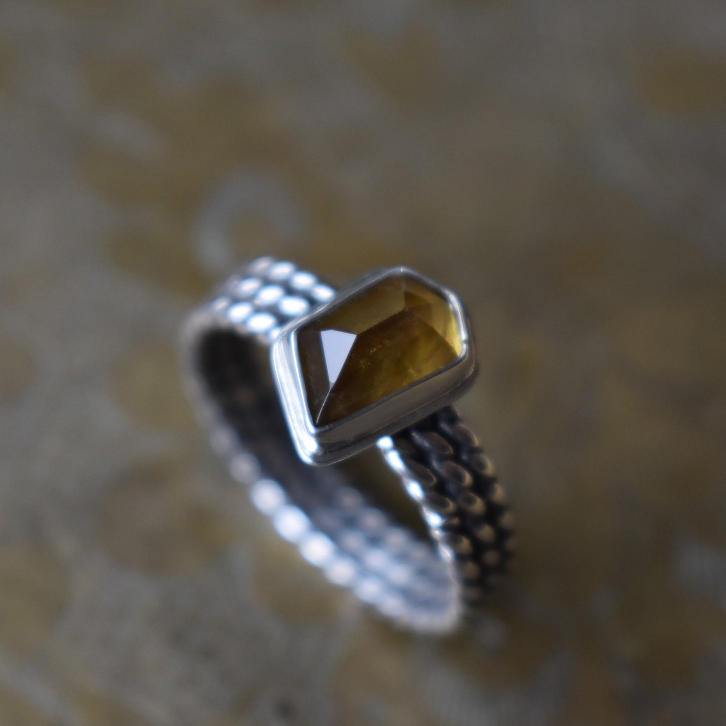 Faceted Sphene Ring - size 8