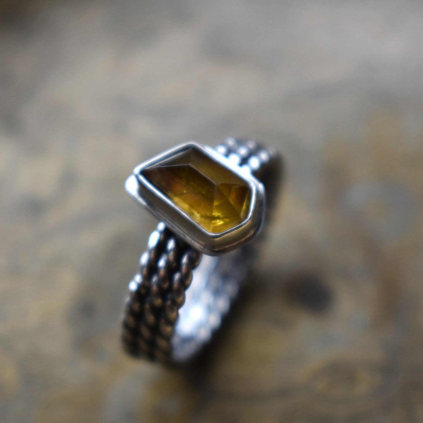 Faceted Sphene Ring - size 8