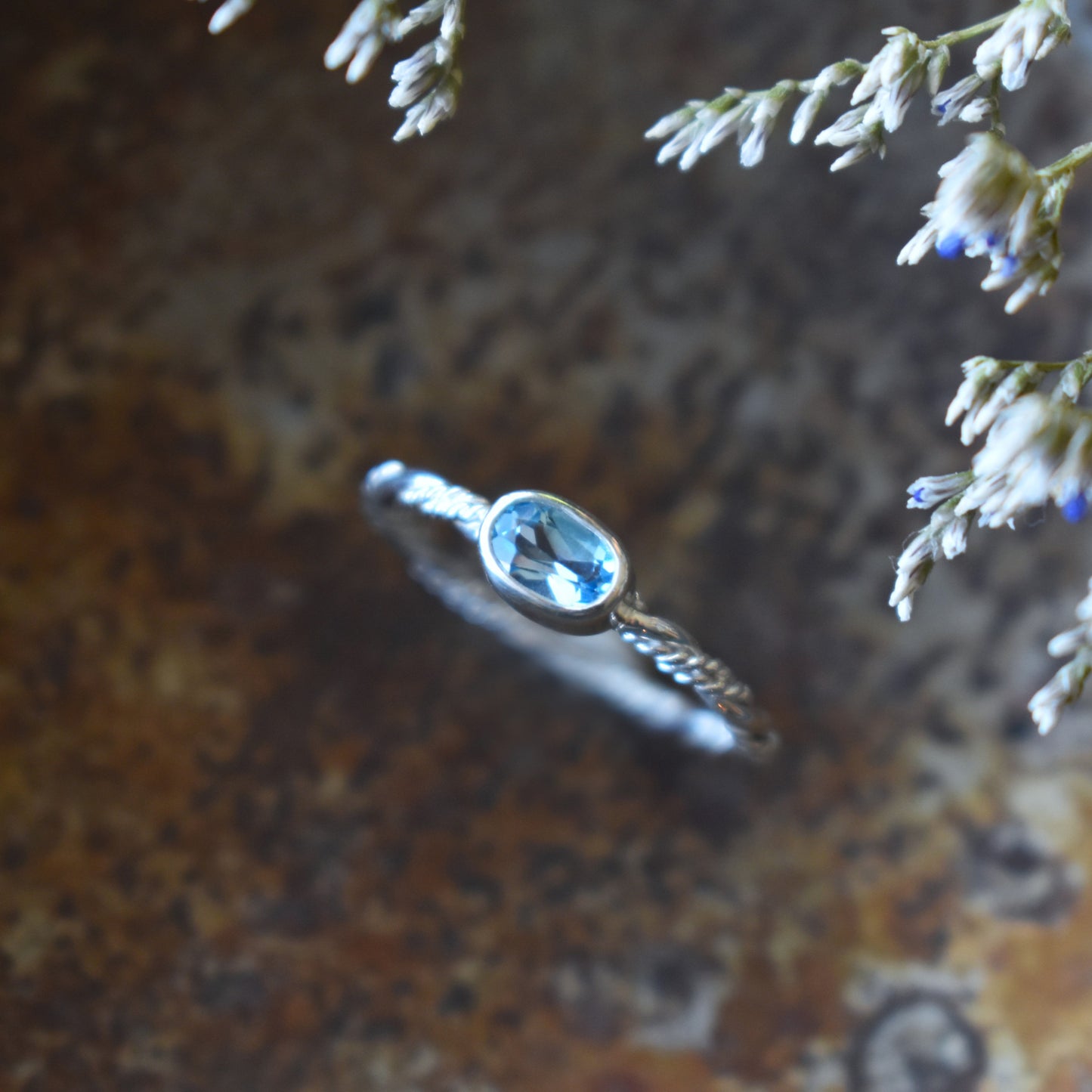 Faceted Swiss Blue Topaz Ring - size 8.5