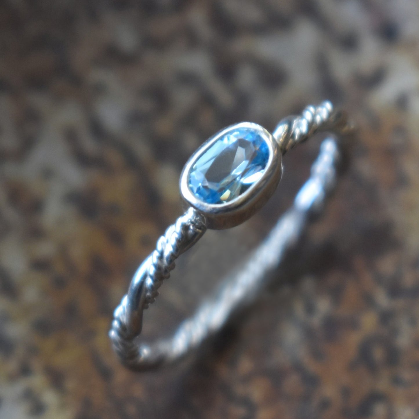 Faceted Swiss Blue Topaz Ring - size 8.5