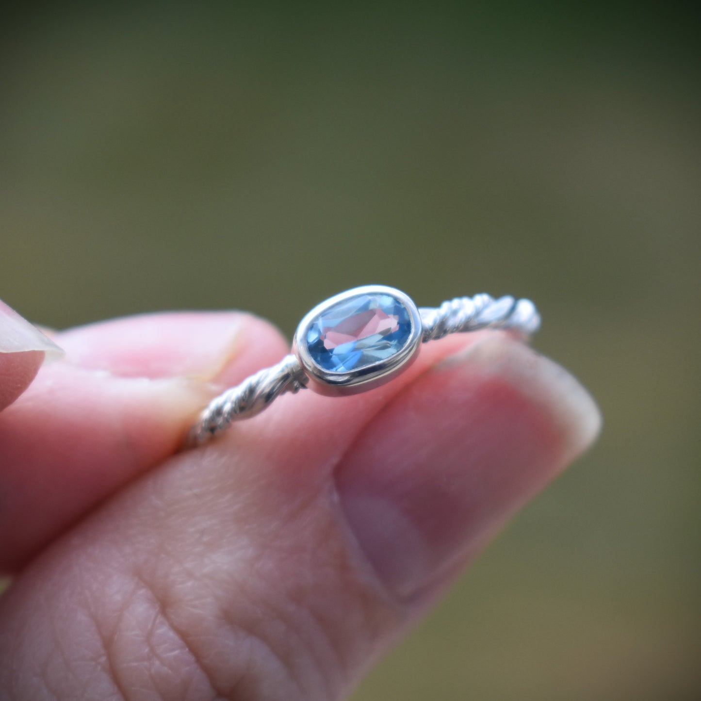 Faceted Swiss Blue Topaz Ring - size 8.5